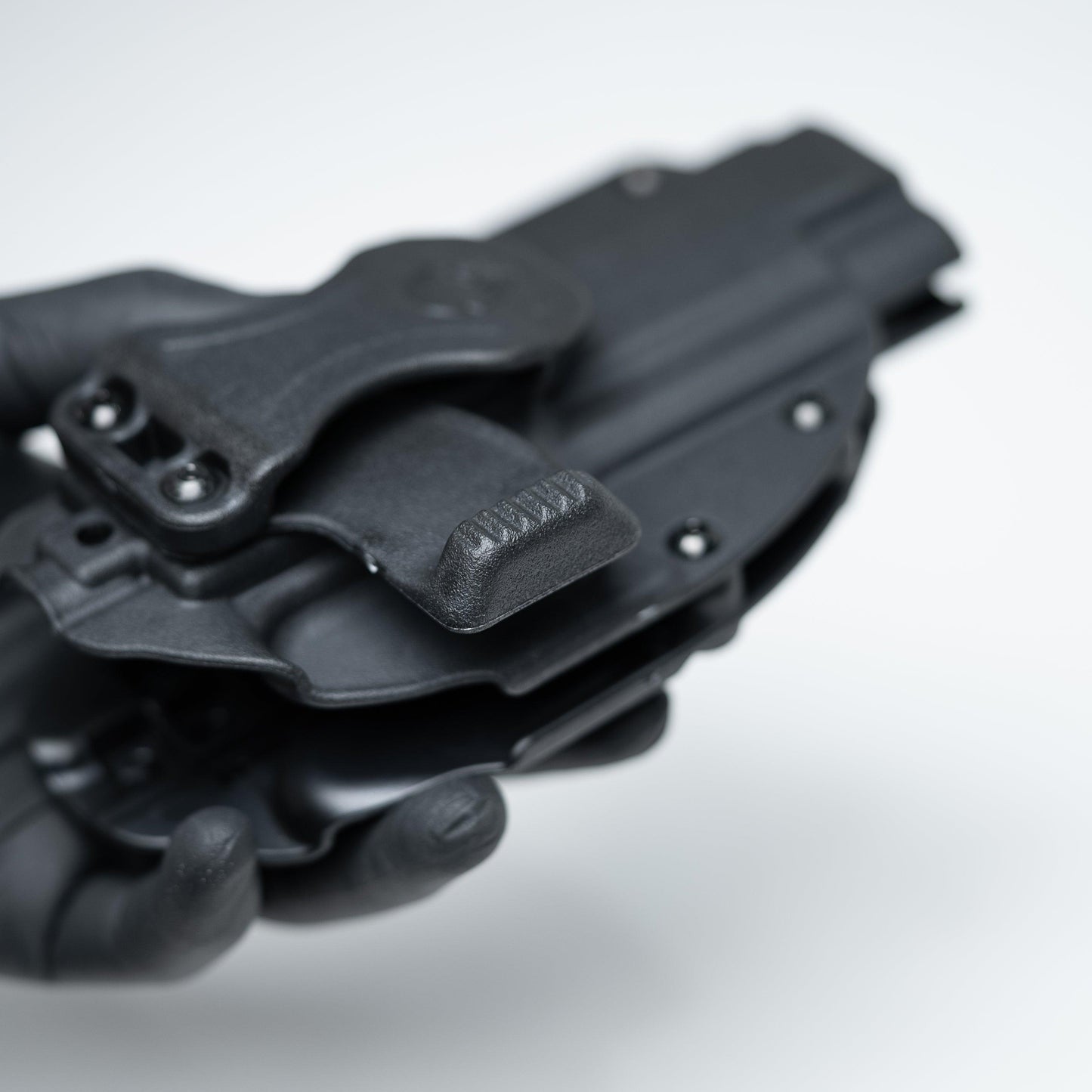 Photon Holster shown in IWB concealed carry setup with belt clips